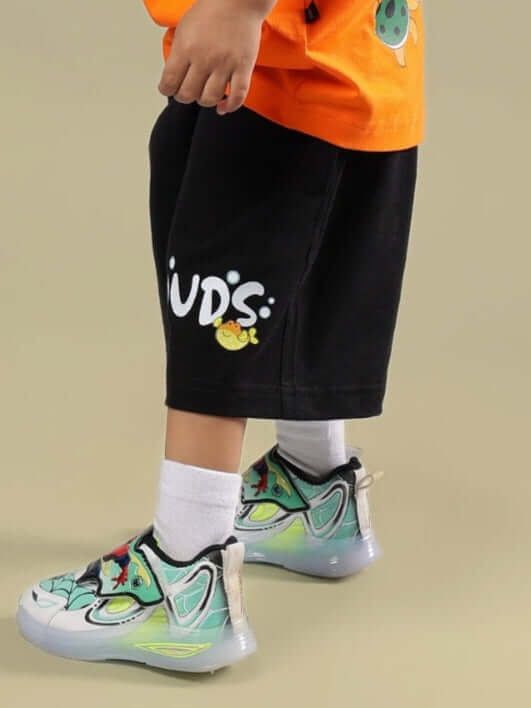 Child wearing DIVING BEAR SHORTS FOR BOYS & GIRLS BLACK by DUDS