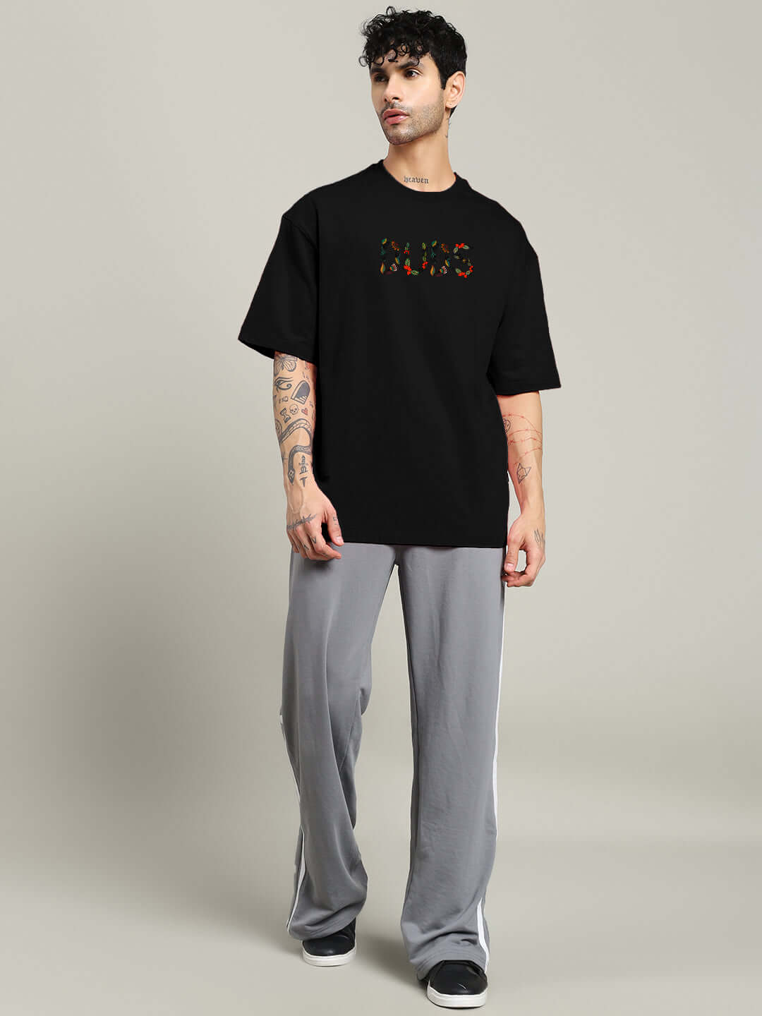 Man wearing DRAGONFLY OVERSIZED T-SHIRT in black, made of premium cotton French terry with bio-washed finish, India origin.
