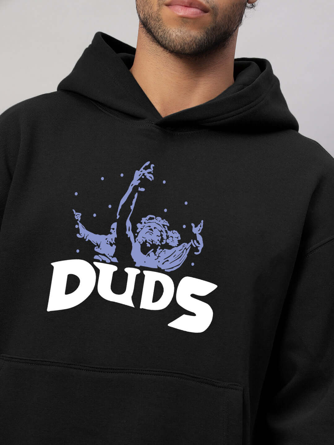 Person wearing WEARDUDS DREAMER FLEECE HOODIE BLACK with artistic graphic design.
