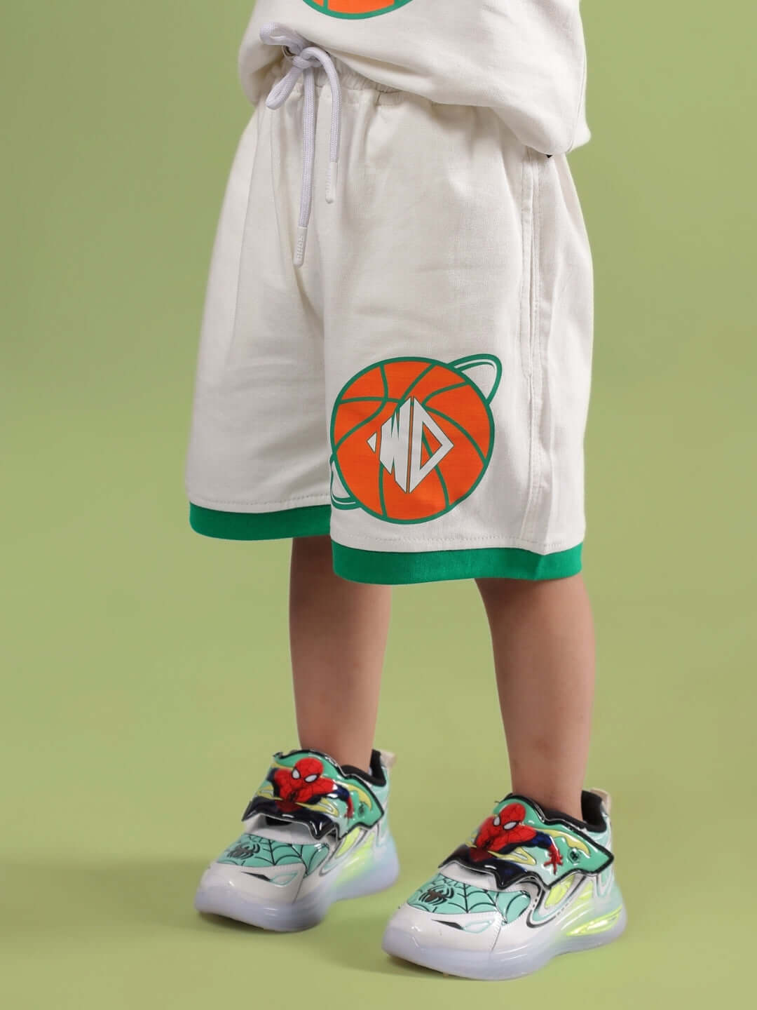 DRIBBLE SHORTS FOR BOYS & GIRLS OFF WHITE with basketball design, made by experienced tailors, suitable for custom fit options.