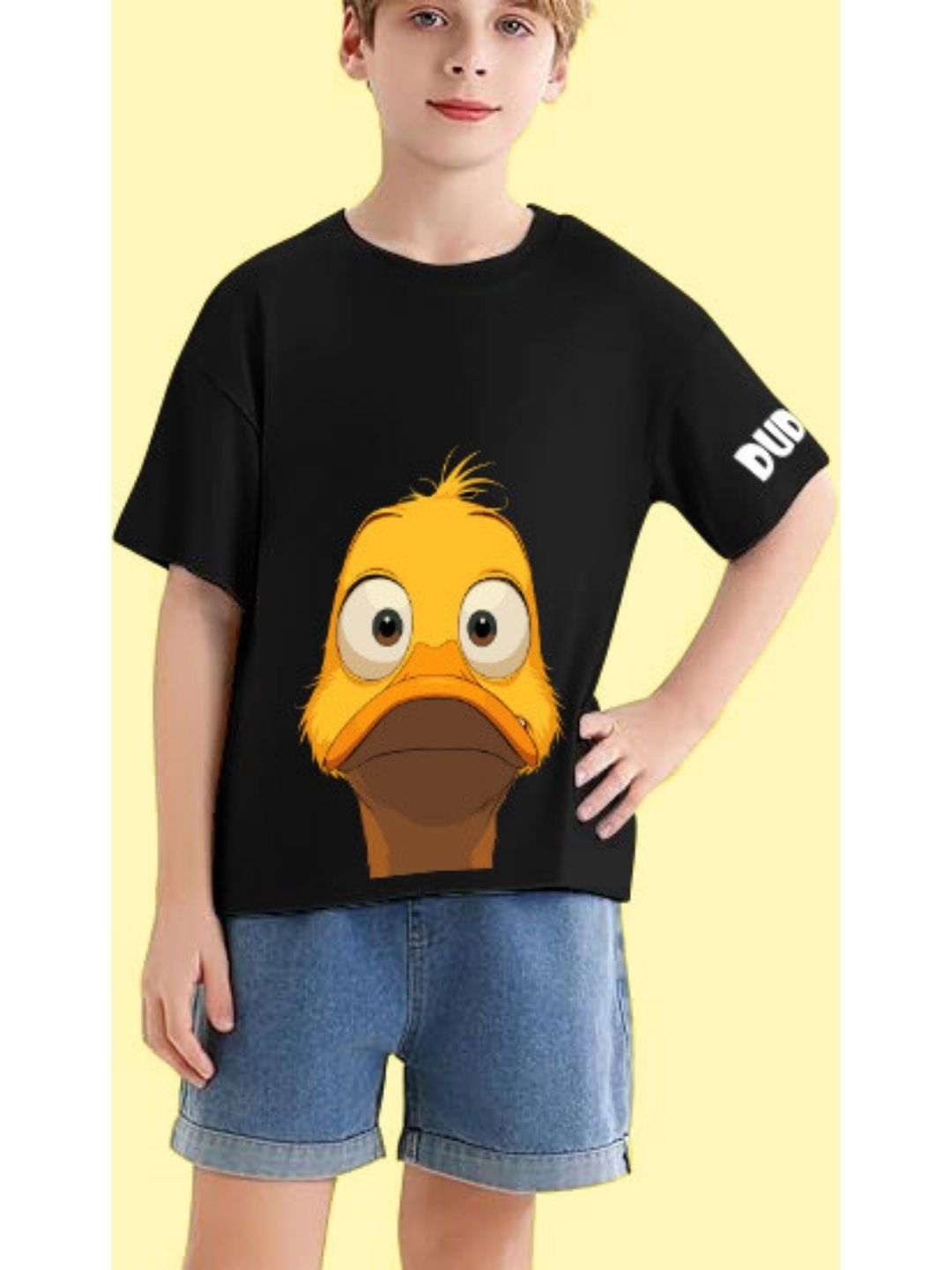 Child wearing DUCK FACE T-SHIRT FOR BOYS AND GIRLS BLACK, featuring a playful duck graphic on a black tee.