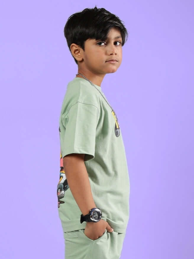 Boy wearing DUCK TALES T-SHIRT FOR BOYS GIRLS NYANZA GREEN with character graphic