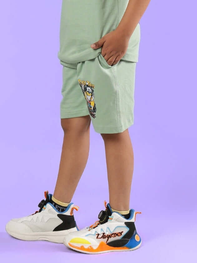 DUCK TALES SHORTS FOR BOYS & GIRLS NYANZA GREEN, kids wearing green shorts with colorful sneakers, tailored by DUDS