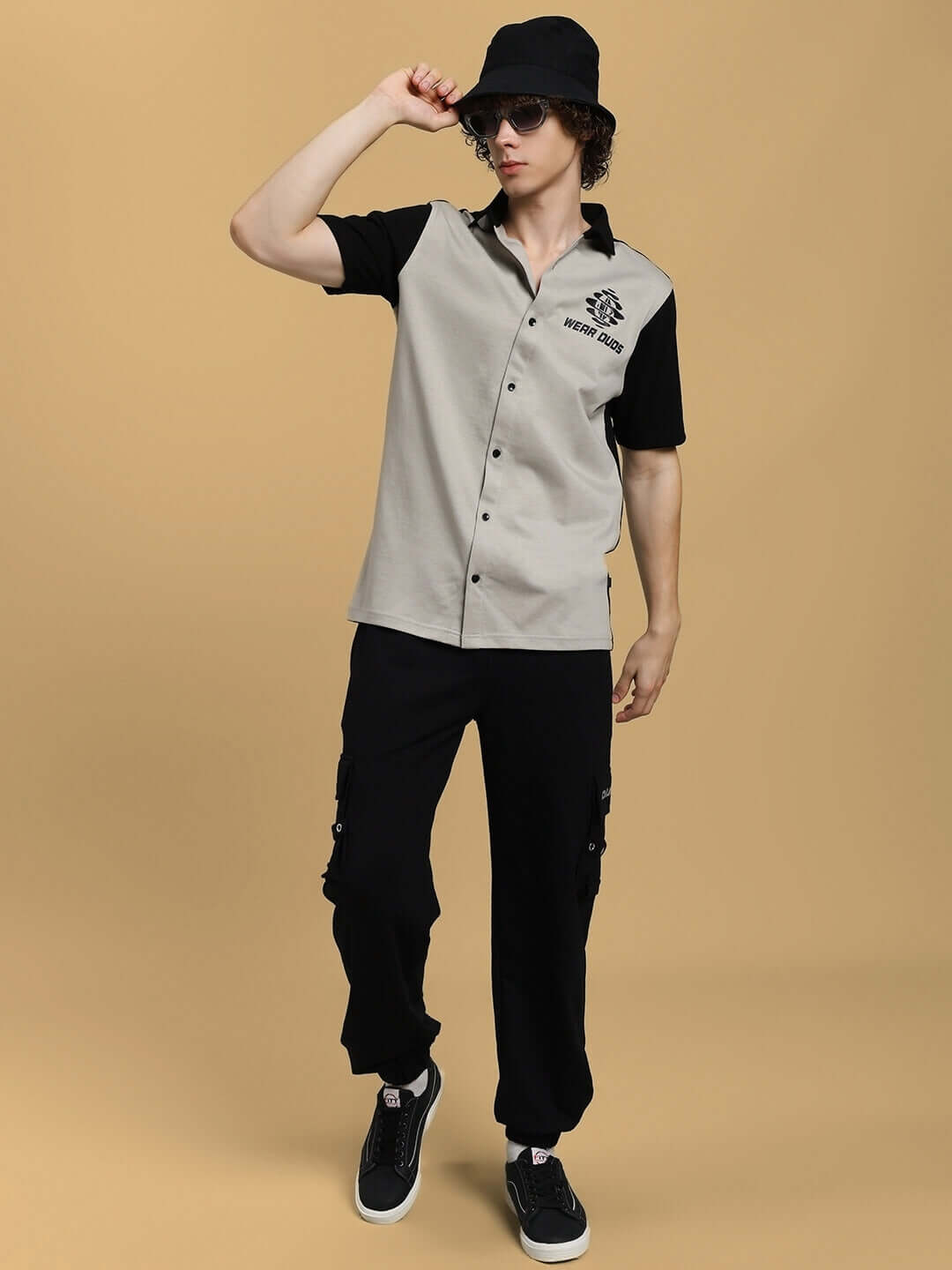 Model wearing DUDS COMMANDO JOGGERS in black with custom fit option by DUDS, made to order with 7-10 days shipping.