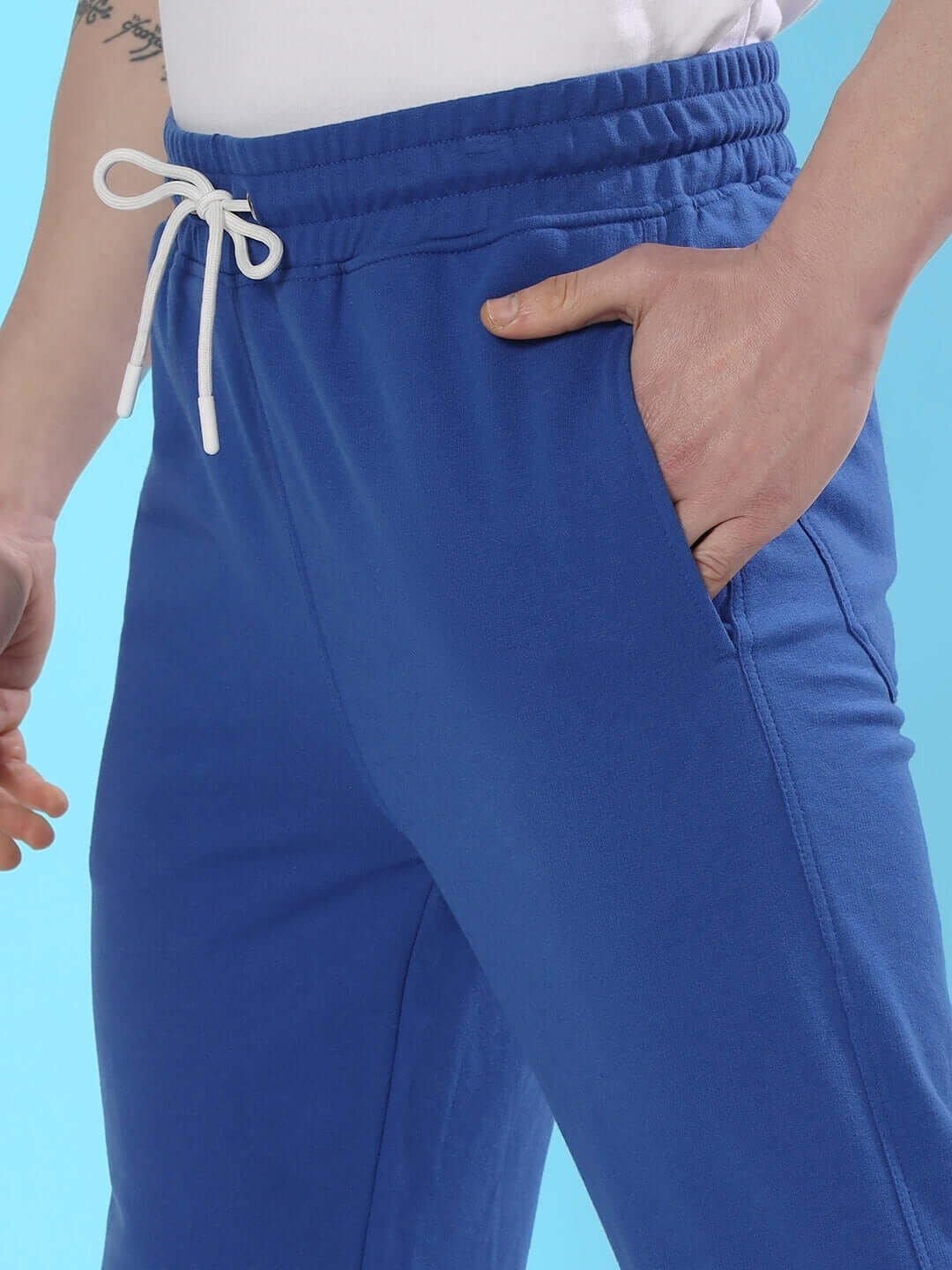 Royal blue DUDS RACER joggers close-up, featuring a custom fit option, crafted by skilled tailors for personalized comfort.