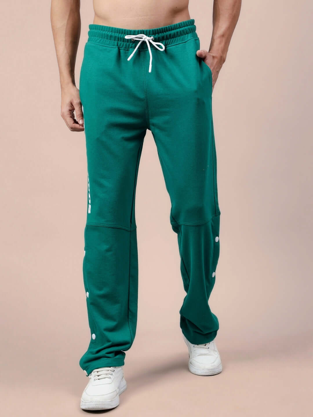 Men's teal green joggers with drawstring, made to order by DUDS. Available in custom fit for prepaid orders. Stylish and comfortable wear.