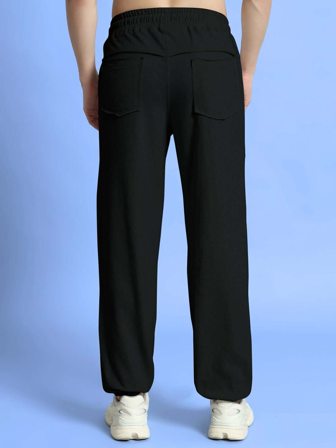 Back view of WEARDUDS GRAZE JOGGERS COTTON BLACK showcasing comfort and style.