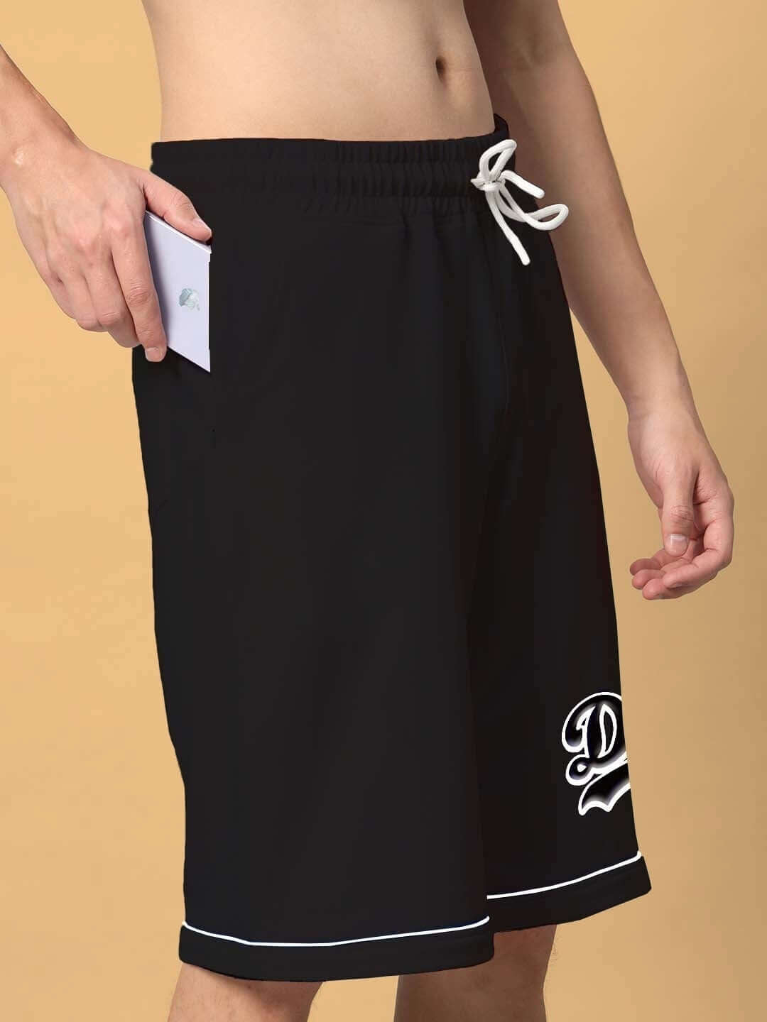 Black colorblock shorts from DUDS INDA HOUSE Co-Ord Set featuring drawstring and pocket detail, made with premium cotton fabric.