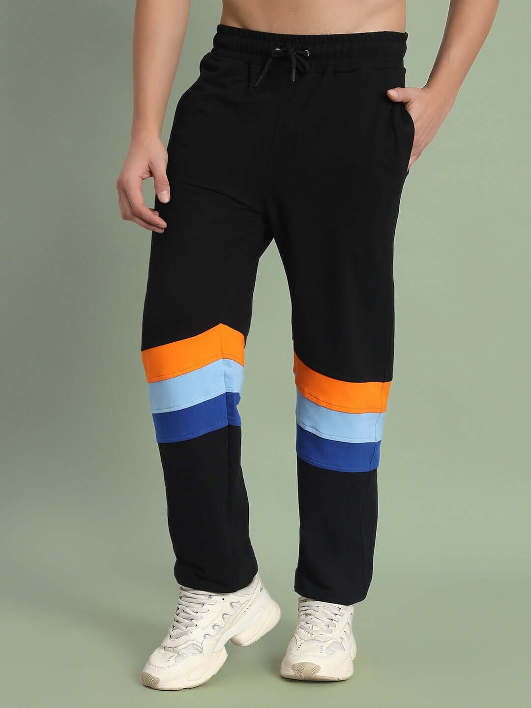 Stylish black DUDS Jasper joggers with colorful stripes, customizable size options, and made-to-order craftsmanship.