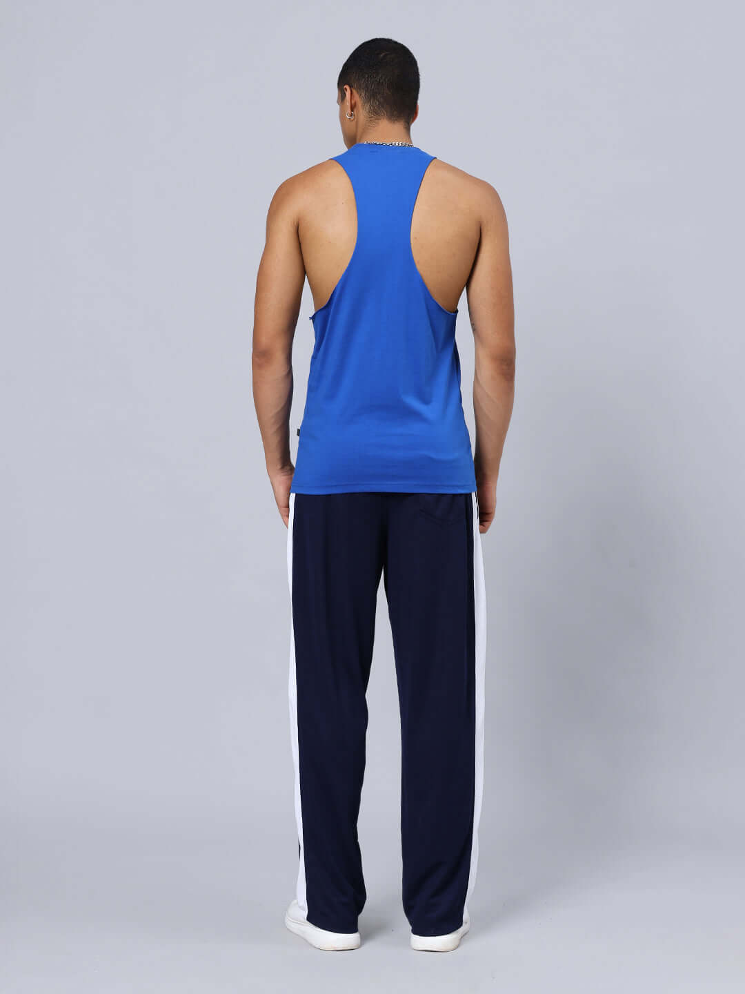 Back view of DUDS KINGDOM GYM CO-ORD SET BLUE showcasing tank top and joggers with elasticated waistband.