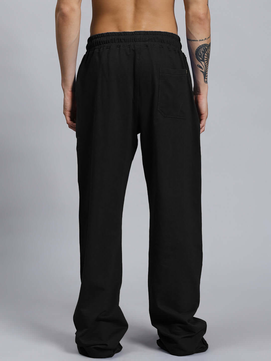 Back view of DUDS SWIFT JOGGER COTTON TERRY BLACK showing its comfortable fit and design.