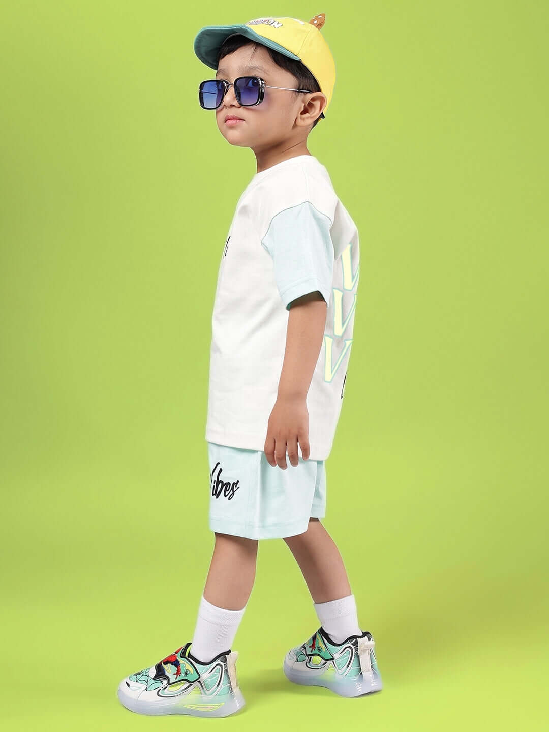 DUDS VIBES CO-ORD FOR BOYS & GIRLS OFF WHITE-BLUE outfit modeled by a child, showcasing trendy fashion style