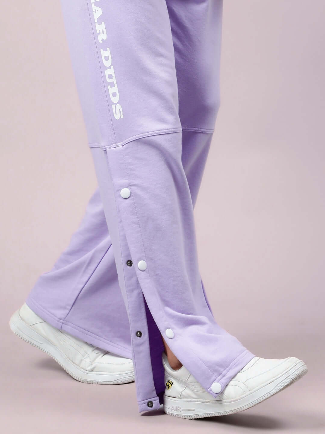 DUDS Racer Joggers in Lavender with snap buttons and custom fit option, tailored for comfort and style, shown with casual white sneakers.