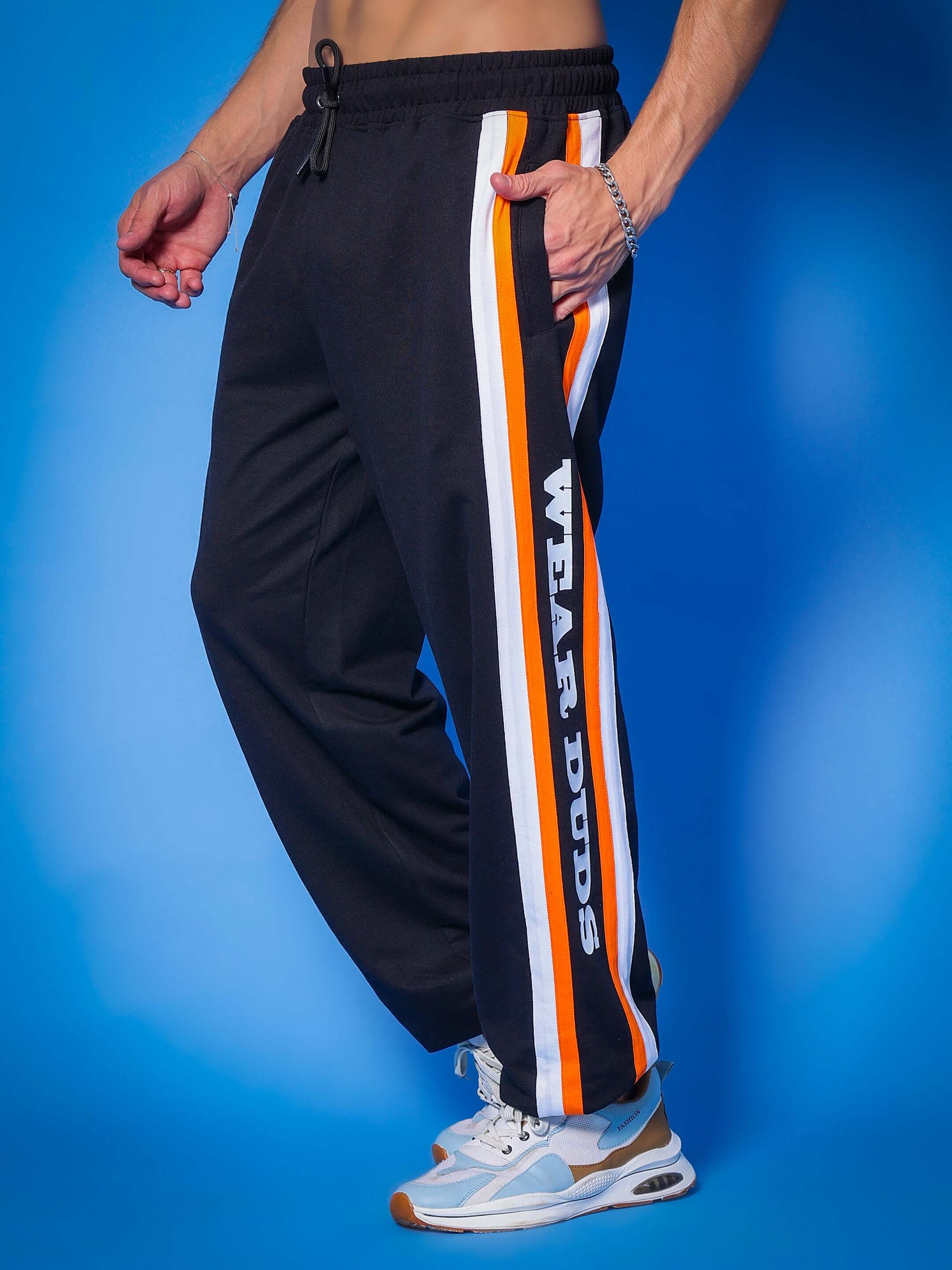 Black DUDS HD Bolt Joggers with side stripes, featuring customizable fit option for a personalized style.
