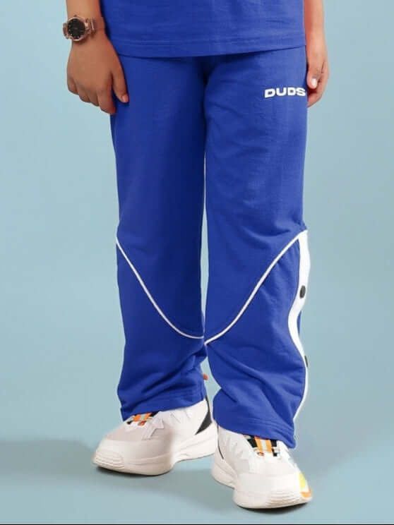 Child wearing EDDIE JOGGER FOR BOYS & GIRLS BLUE, showcasing casual style and comfort.
