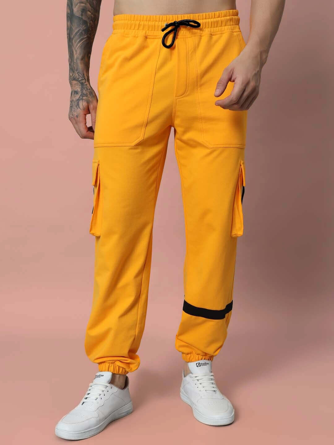 Model wearing EDIFICE RELAXED FIT CARGO PANT YELLOW with two side pockets, showcasing bold style and comfort in a vibrant yellow color.