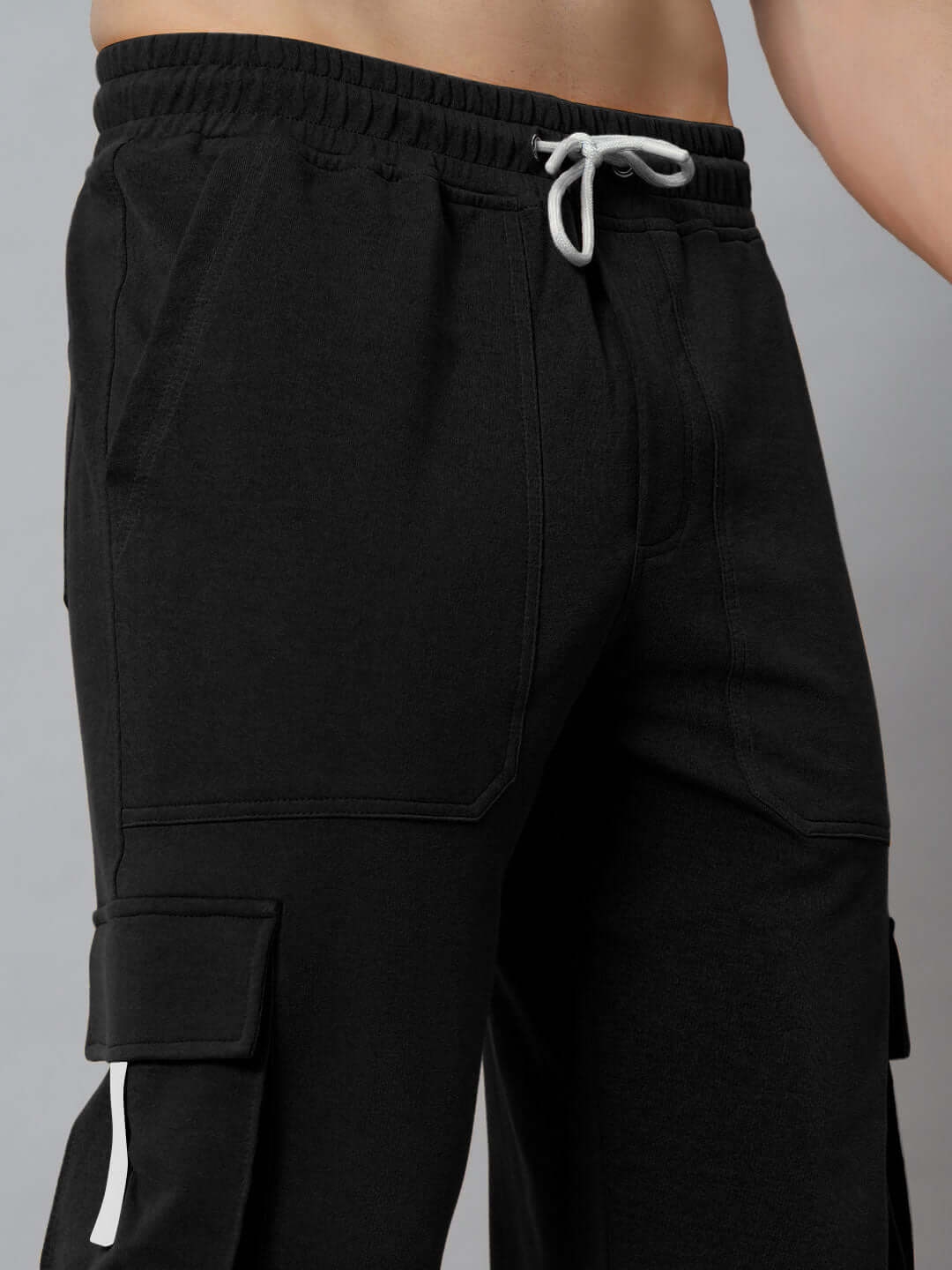 Black EDIFICE relaxed fit cargo pant with drawstring waist and large side pockets, made to order by DUDS.