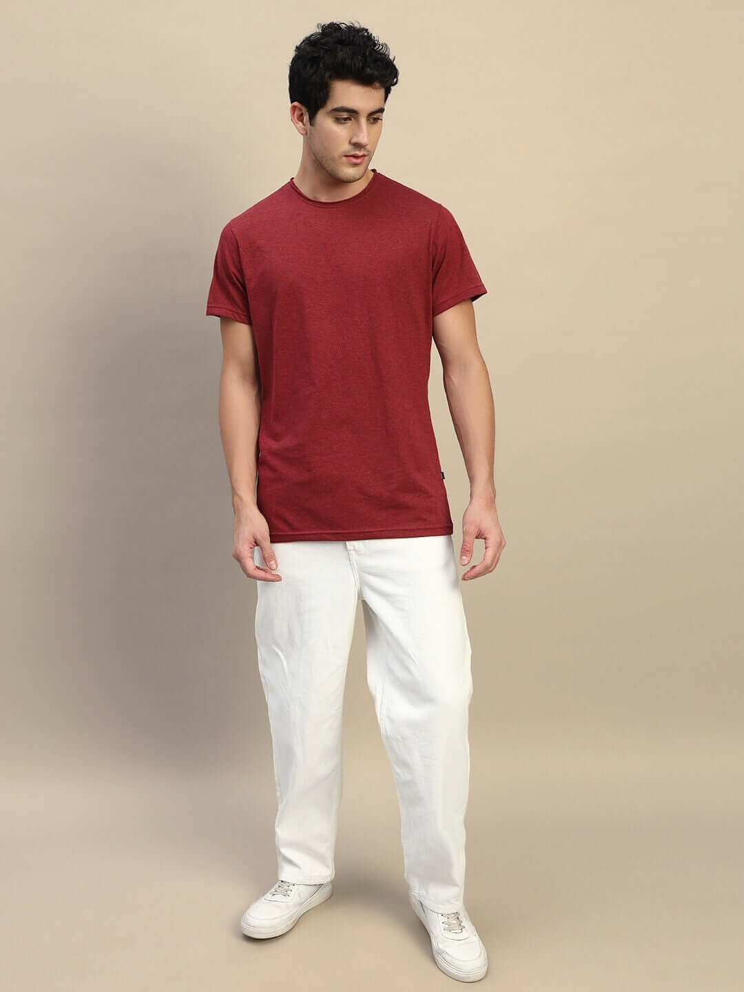 Model wearing ELEX REGULAR FIT T-SHIRT MAROON, made from premium heavy gauge fabric and 100% cotton melange, bio-washed for comfort.