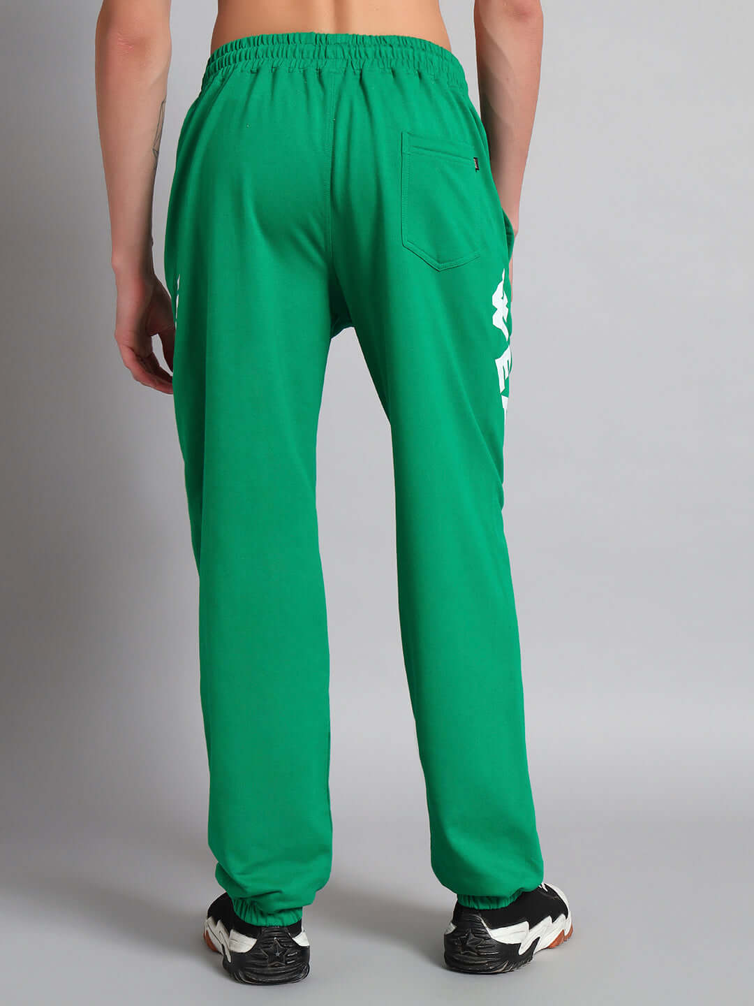 Back view of ELLEN RELAXED FIT JOGGER GREEN with elastic waistband and pocket detail.