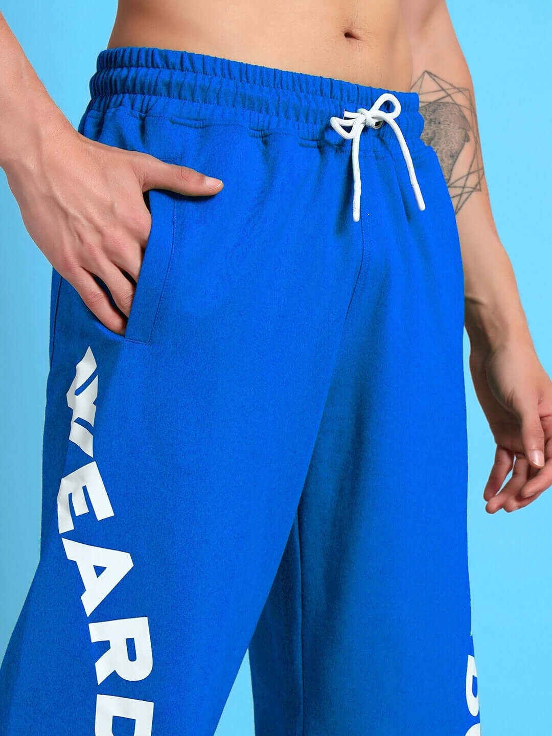Close-up of ELLEN RELAXED FIT JOGGER BLUE showcasing premium cotton-blend fabric with streetwear style and comfort.