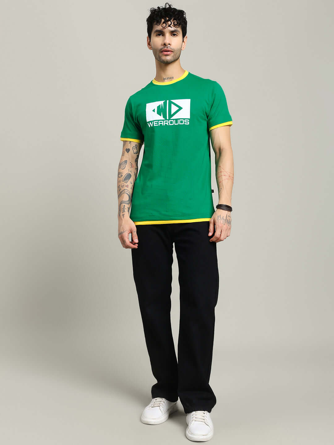 Model wearing ELMER REGULAR FIT T-SHIRT GREEN, showcasing comfort and style with premium cotton fabric and regular fit.