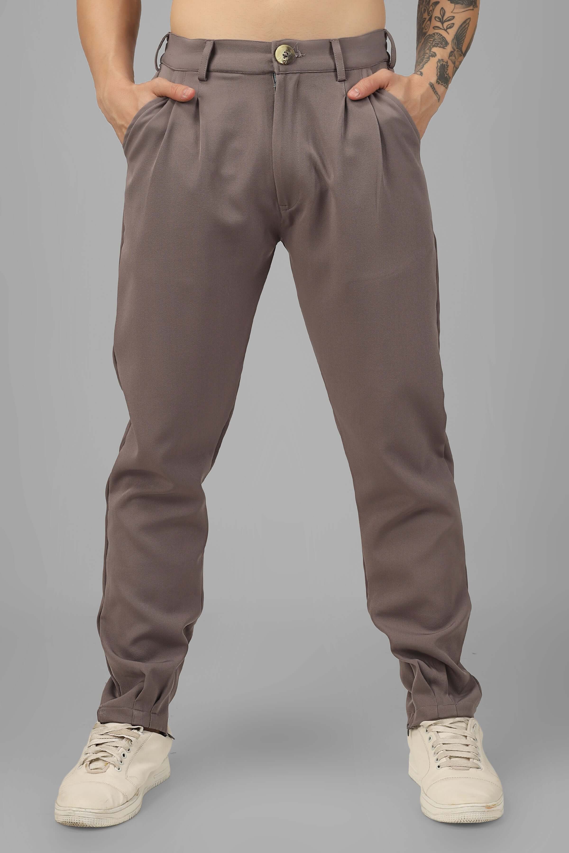 Front view of a model wearing stretchable banana crepe pants from the Embellished Owl Co-Ord Set by DUDS.