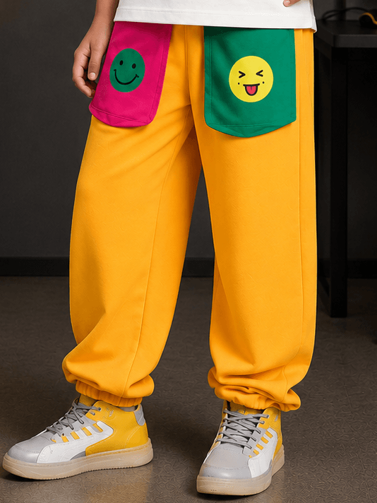 EMOJI VIBES JOGGER FOR BOYS GIRLS YELLOW featuring bright colors and playful emoji pockets.