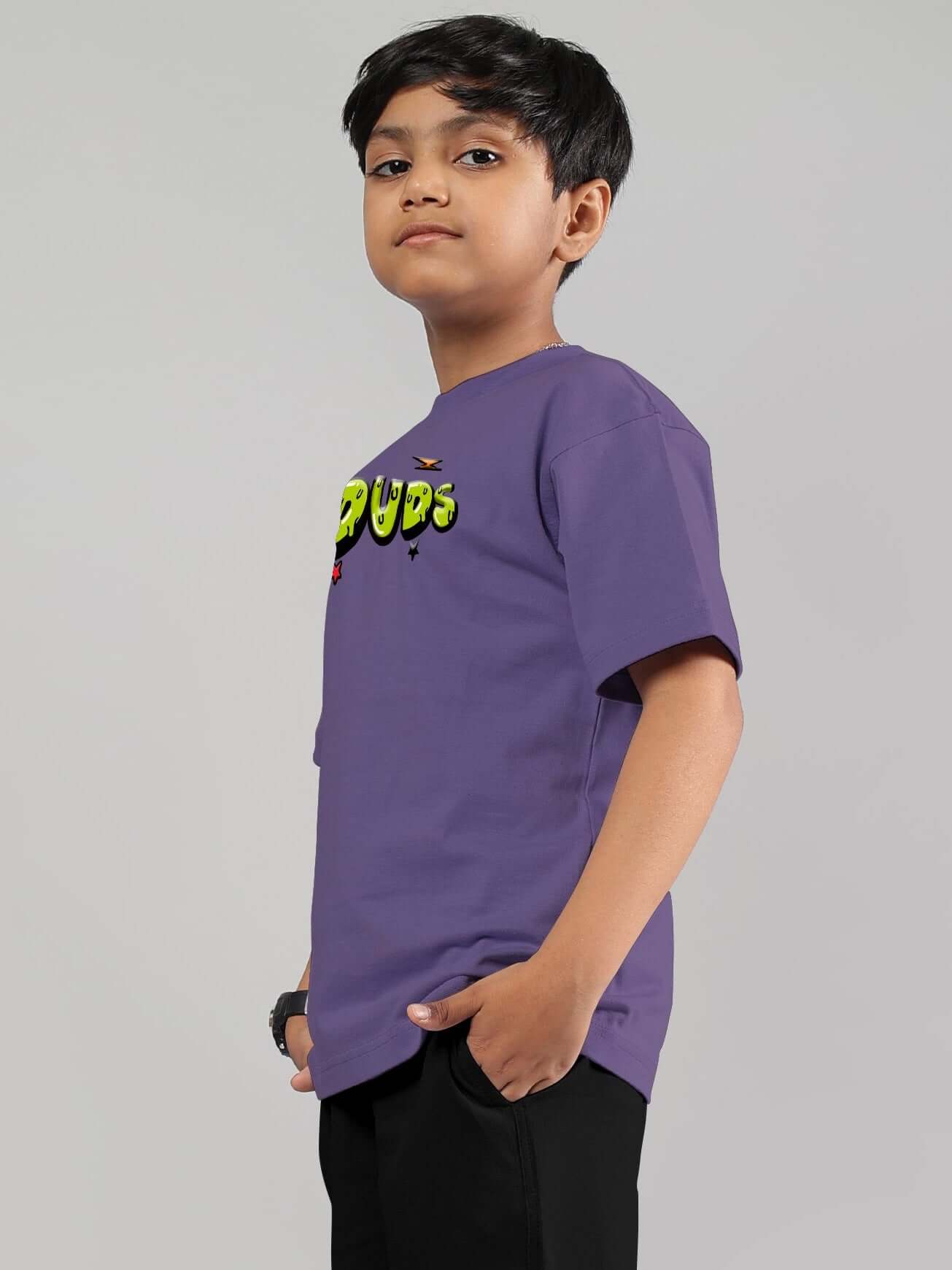 Boy wearing wisteria purple Escaped Tweety T-shirt by DUDS, side view, showcasing comfortable fit for boys and girls.