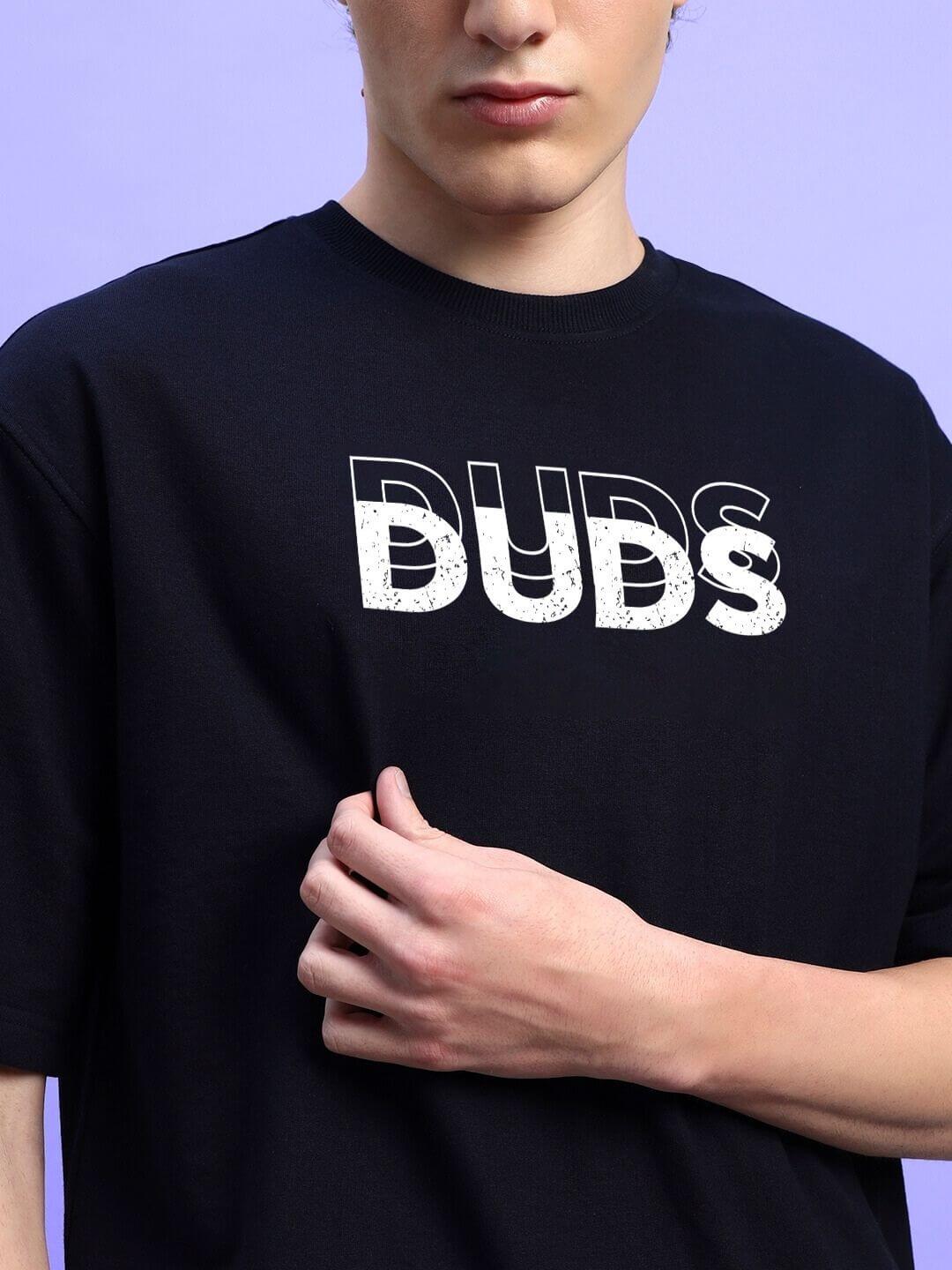Model wearing EVERYTHING IS TEMPORARY OVER-SIZED T-SHIRT BLACK with bold lettering, perfect for versatile, authentic styling.