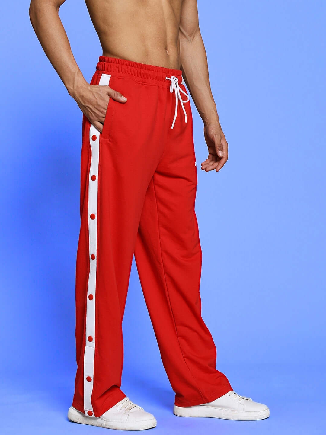 EZEL Relaxed Fit Red Jogger with white side stripe detailing, designed for comfort and style. Customizable fit available.