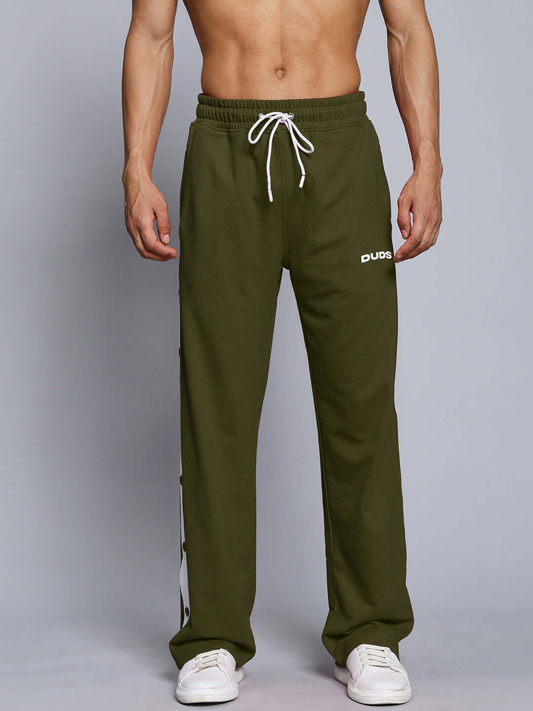 Model wearing EZEL RELAXED FIT JOGGER OLIVE GREEN, showcasing its comfortable and stylish design perfect for casual wear.