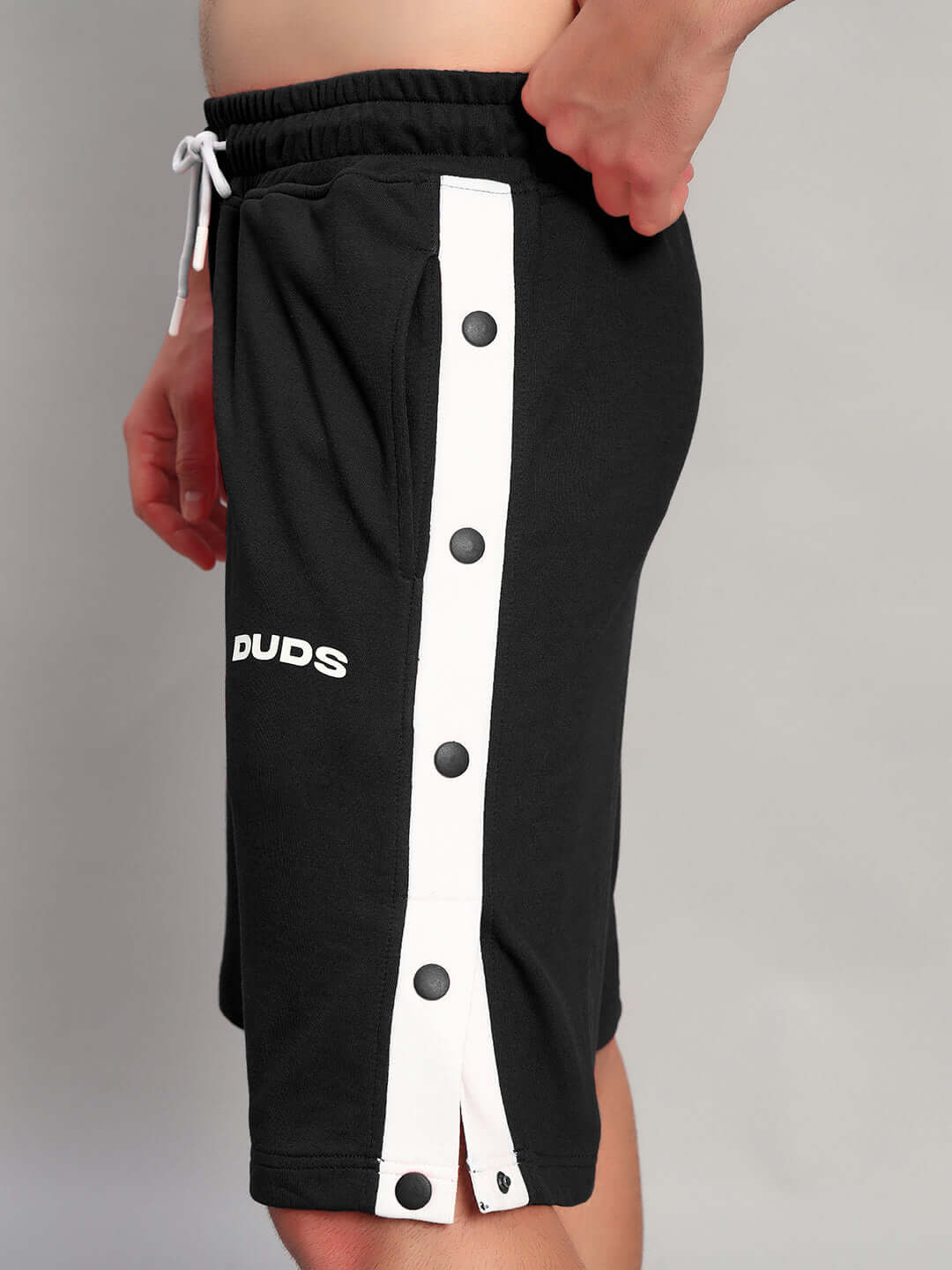 Ezel Regular Fit Shorts Black cotton by Wear Duds showcasing side buttons and modern design for casual streetwear style.
