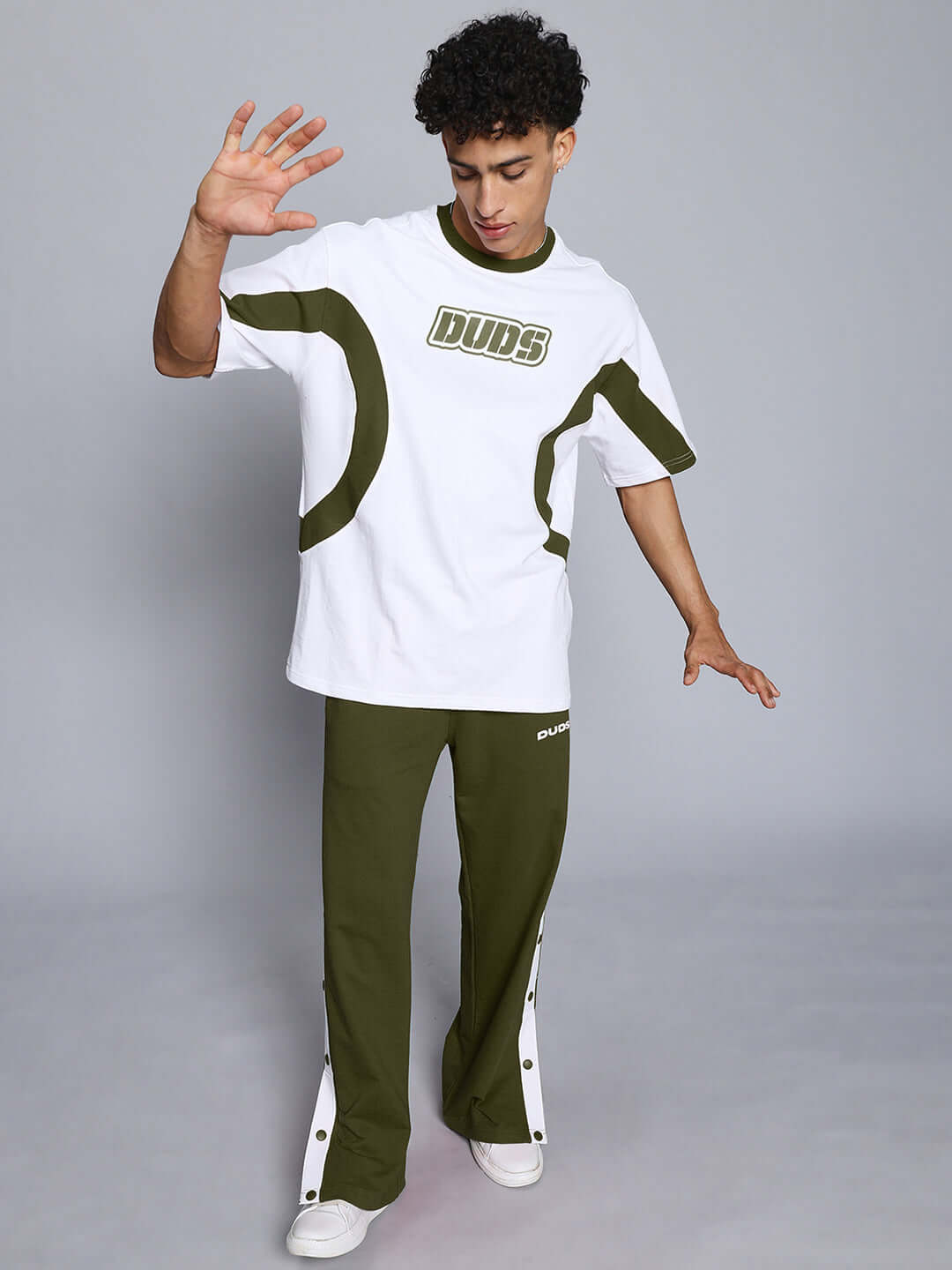 EZEL RELAXED FIT CO-ORD SET WHITE-OLIVE modeled by a person, showcasing comfortable and stylish design in a premium cotton blend.