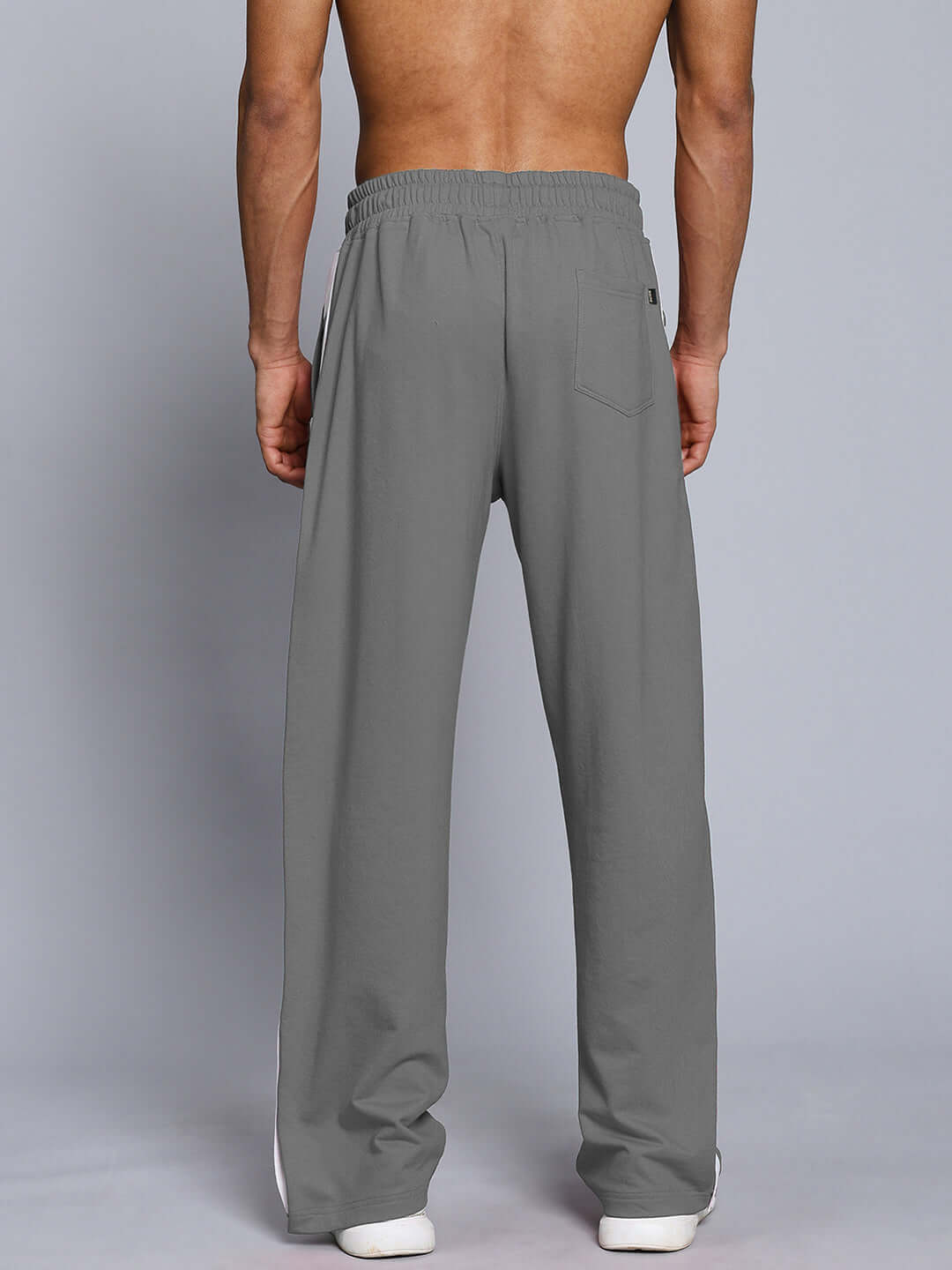 Back view of EZEL RELAXED FIT CO-ORD SET WHITE-GREY joggers, featuring elastic waistband and red & white contrast panel for a comfy fit.