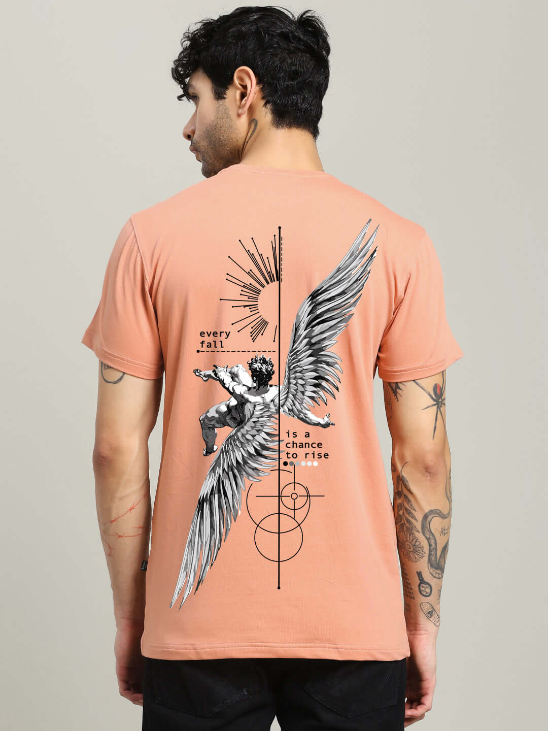 Back view of the FALLEN ANGLE regular fit peach T-shirt with printed design, featuring heavy gauge 100% cotton material.