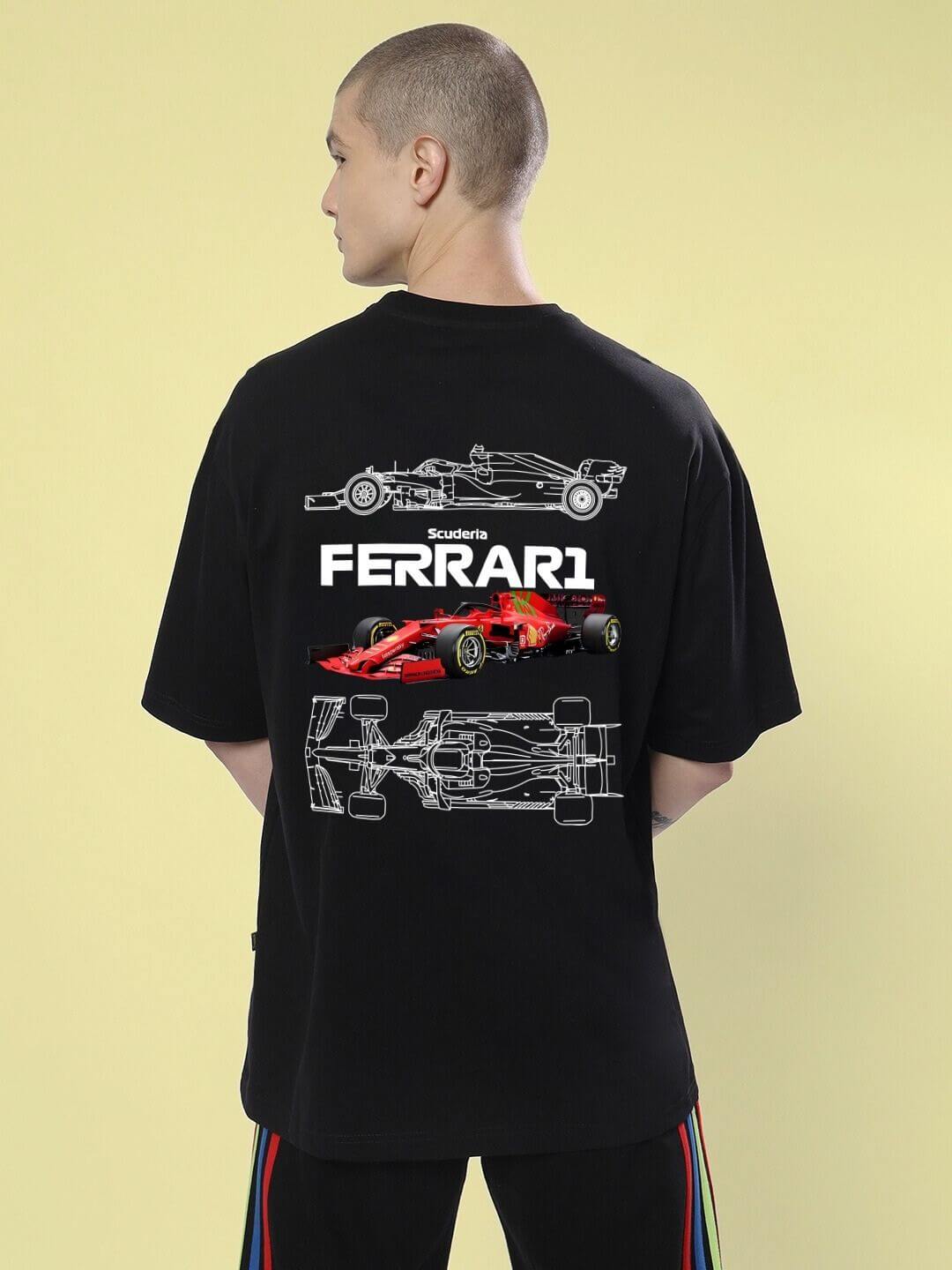Back view of a FARARI PRINTED OVERSIZED T-SHIRT BLACK with racing car design and Farari-inspired print on a person.