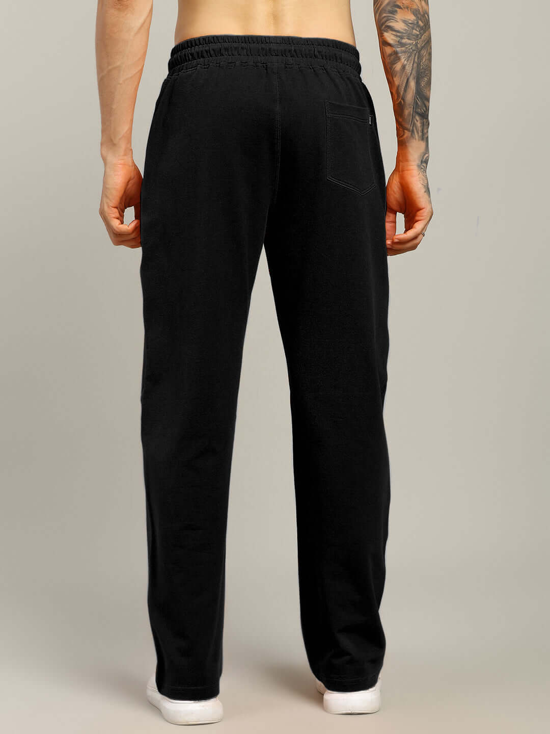Back view of Fearless Contrast Positive Relaxed Fit Joggers in black-blue, showing comfortable fit and elastic waistband detail.