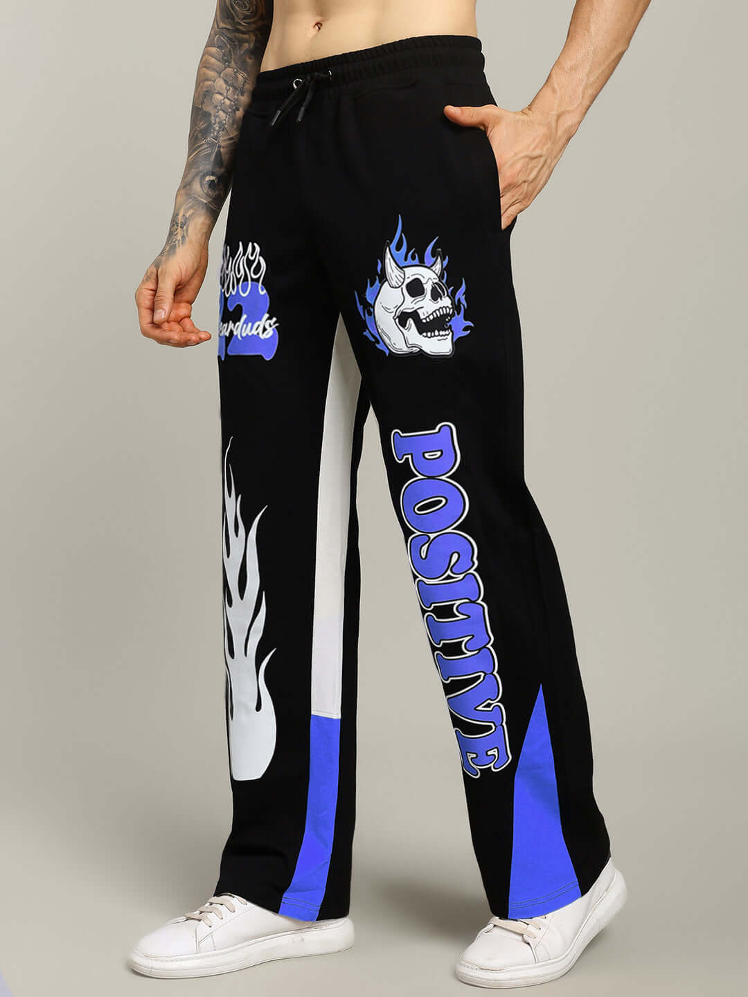 FEARLESS CONTRAST Positive Relaxed Fit Joggers in Black-Blue with bold graphics, ideal for custom fit options, available at DUDS.