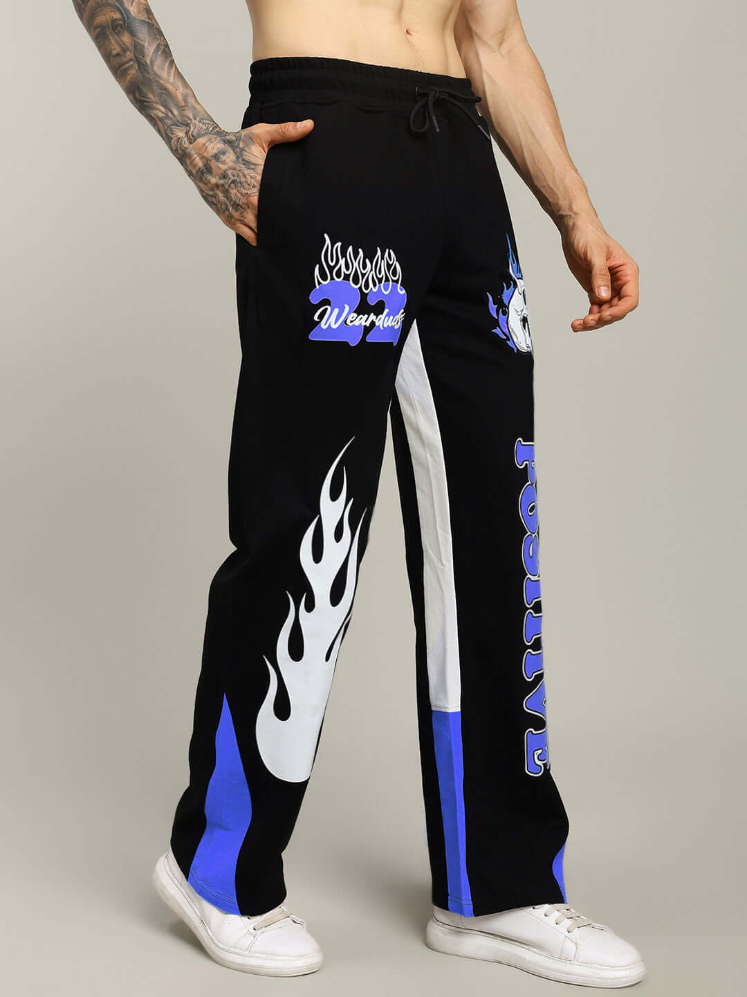 Alt Tag: Fearless Contrast Positive Relaxed Fit Joggers in Black-Blue with bold graphics, highlighting customizable comfort and style.