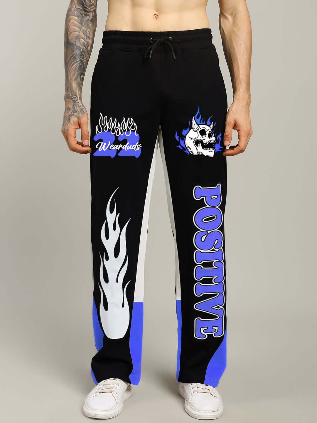 Fearless contrast joggers in black-blue with positive graphics, showcasing relaxed fit, perfect for custom orders by DUDS.
