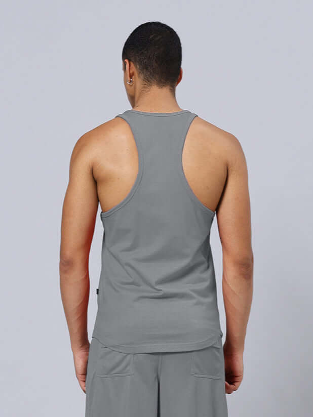 Back view of a model wearing FEEL THE PAIN PRINTED GYM T-SHIRT GREY, showcasing custom fit options for personalized sizing.