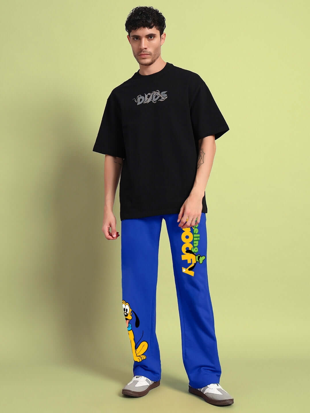 Model wearing FEELING GOOFY RELAXED FIT JOGGER BLUE, showcasing playful streetwear style with premium cotton blend fabric.