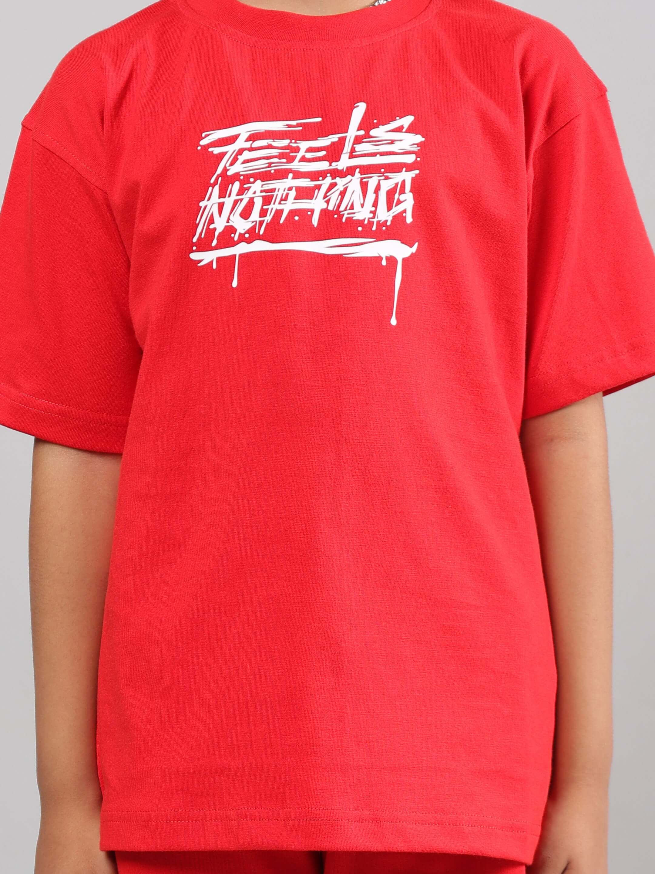 FEELS NOTHING T-SHIRT FOR BOYS GIRLS RED, bold graphic tee in striking red, unisex cotton shirt with relaxed fit, statement apparel for kids.