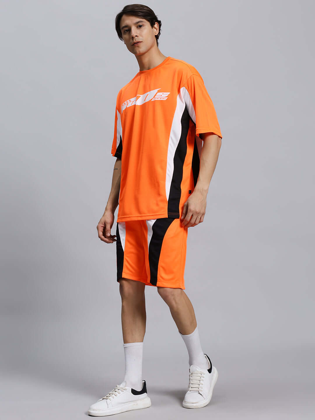 FIFA COLORBLOCK CO-ORD SET ORANGE with sports polyester fabric, featuring a stylish design ideal for athletic wear and casual outings.