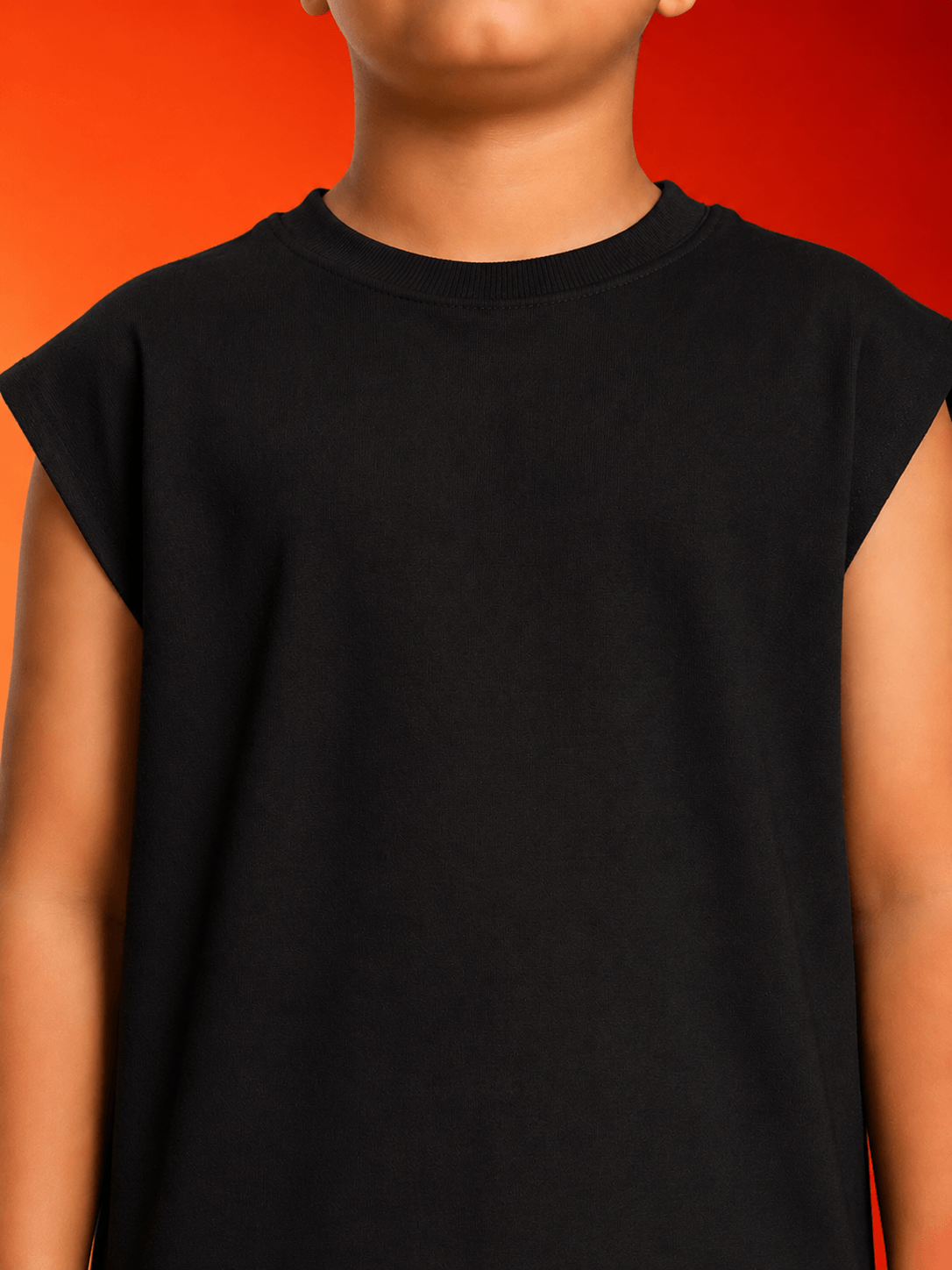 NEON RUSH SLEEVELESS T-SHIRT FOR BOYS GIRLS BLACK worn by a child against a vibrant background.
