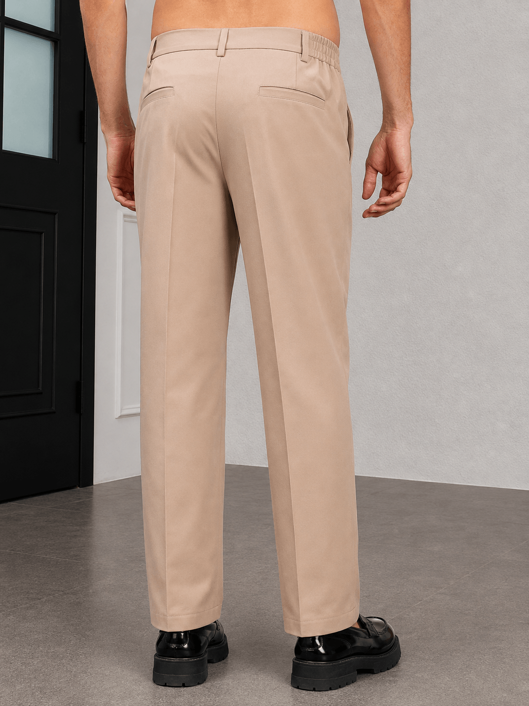HIGH-FLEX TAILORED PANTS BEIGE showcasing a clean back view, perfect for smart-casual occasions and all-day comfort.