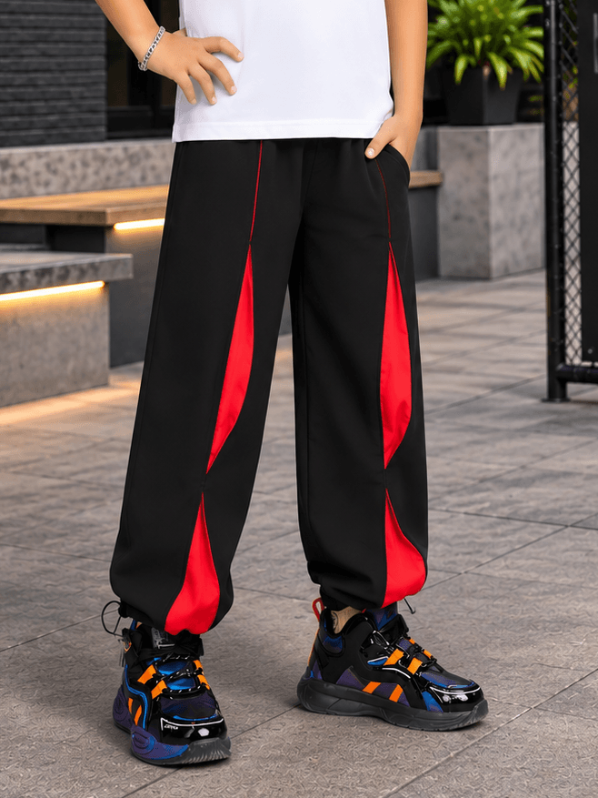 UNISON RELAXED-FIT JOGGER FOR BOYS GIRLS BLACK RED stylish joggers featuring a bold black and red design.