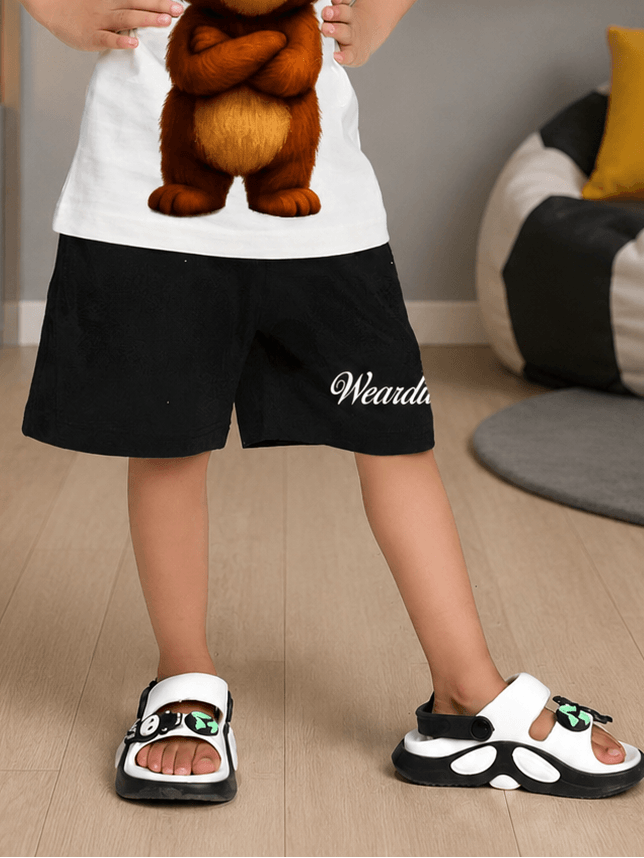 BEAR GRAPHIC CASUAL SHORTS FOR BOYS GIRLS BLACK worn by a child, showcasing playful style and comfort.