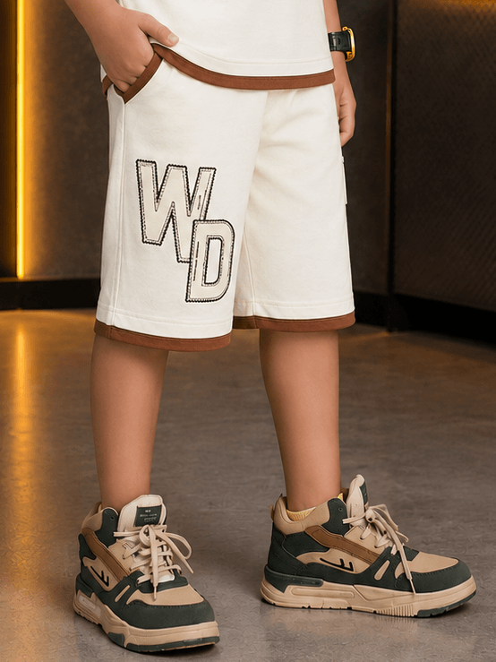 DOWNTOWN SHORTS FOR BOYS GIRLS OFF-WHITE styled with trendy sneakers, perfect for casual outfits.