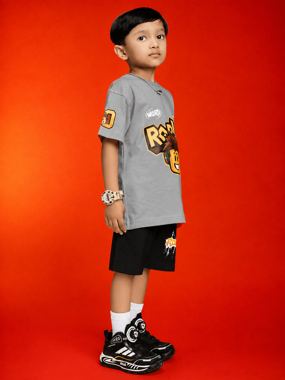 Child wearing ROBLOX WORLD FIT T-SHIRT FOR BOYS GIRLS GREY with stylish shorts and sneakers.